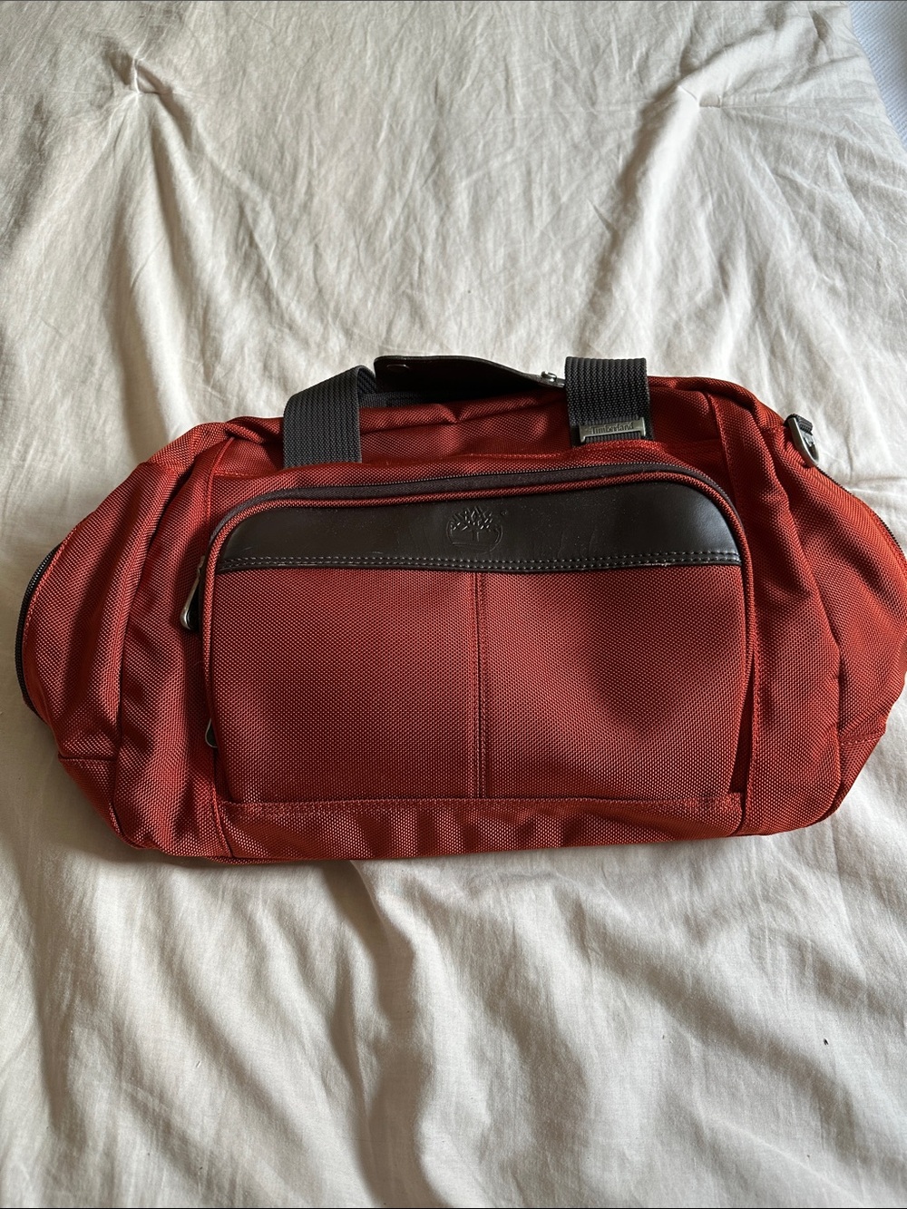 TIMERLAND burnt orange carry on bag
